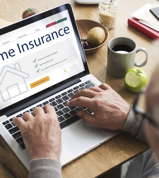 home insurance concept laptop